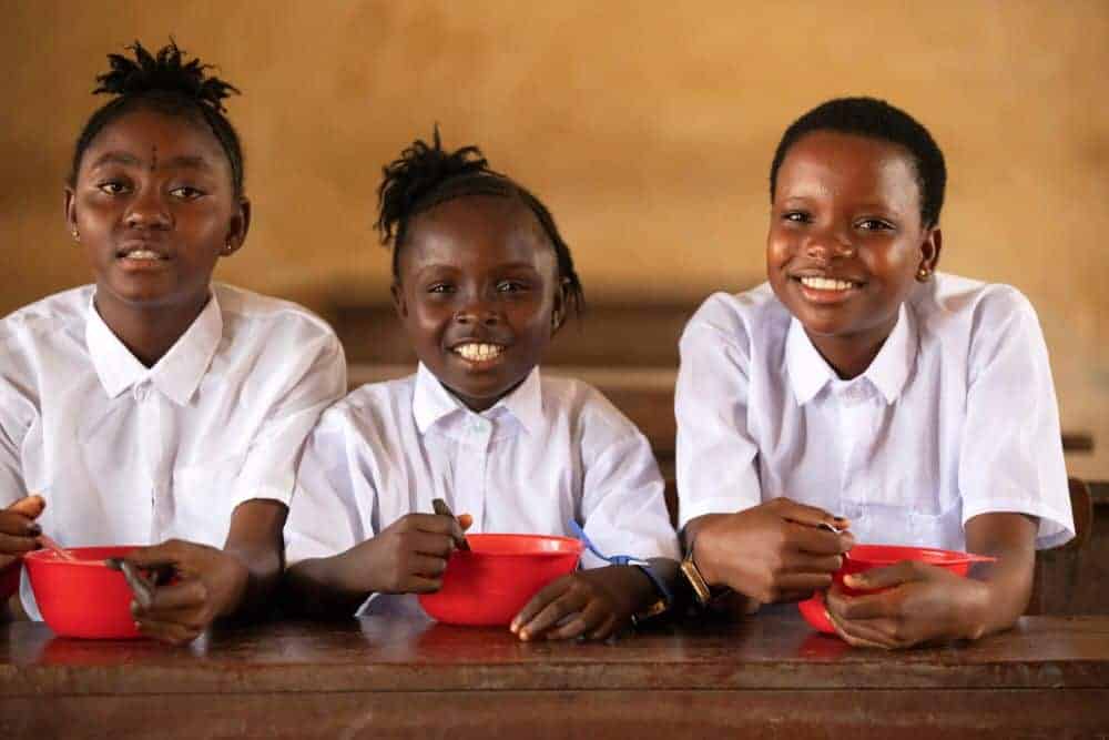 Three young schoolgirls